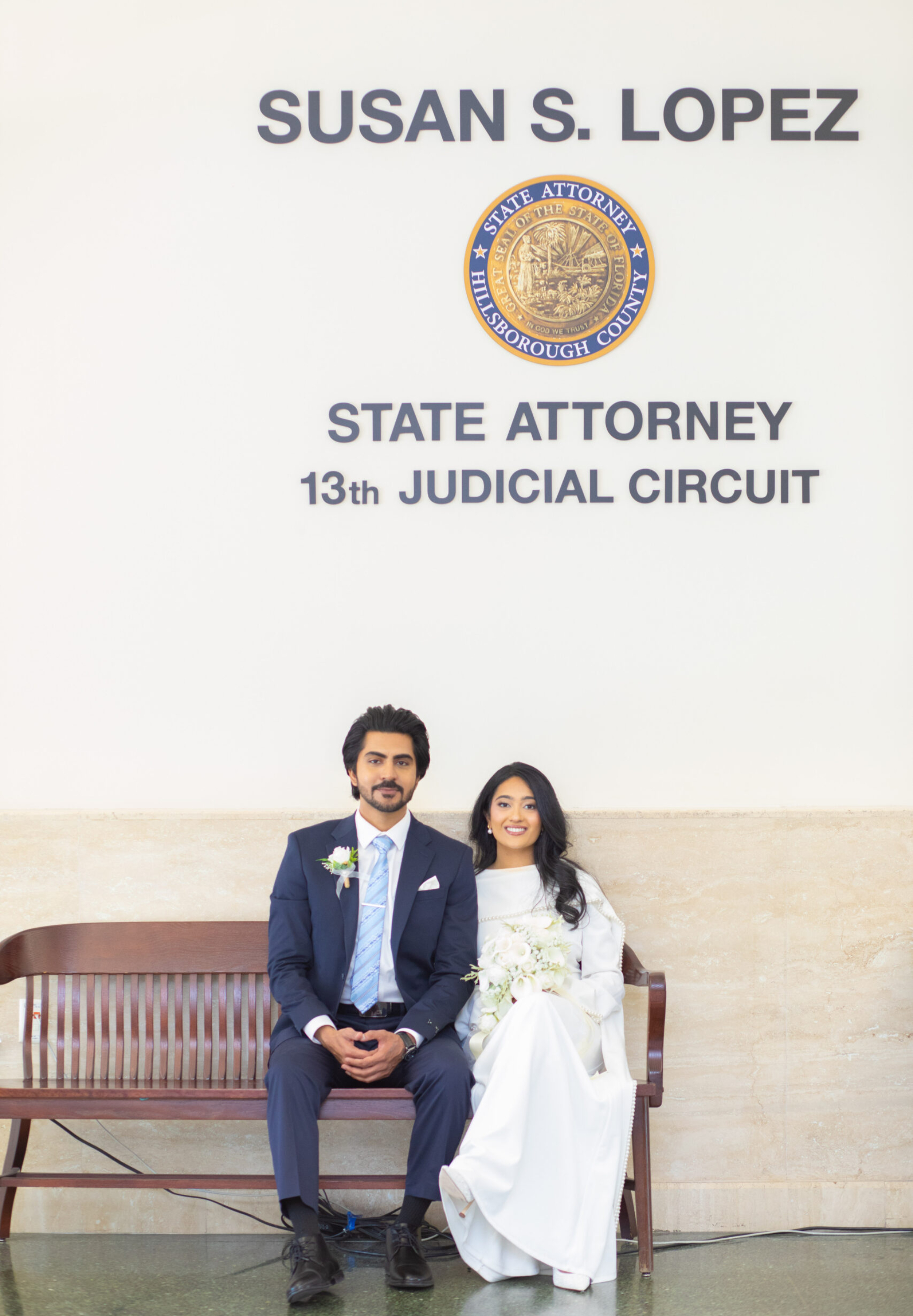 Home Page Candid wedding portrait of a bride and groom smiling at each other during a ceremony in Tampa FL by imkashi Photography