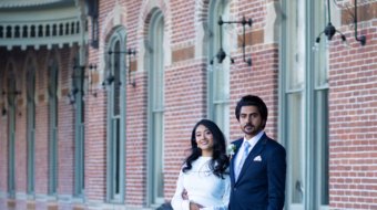 A bride and groom posing for romantic wedding portraits in downtown Tampa near the courthouse squares with city architecture backgrounds by imkashi Photography