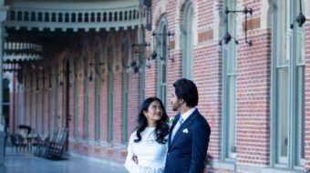 Candid moment of a bride and groom laughing during a wedding reception in Tampa FL